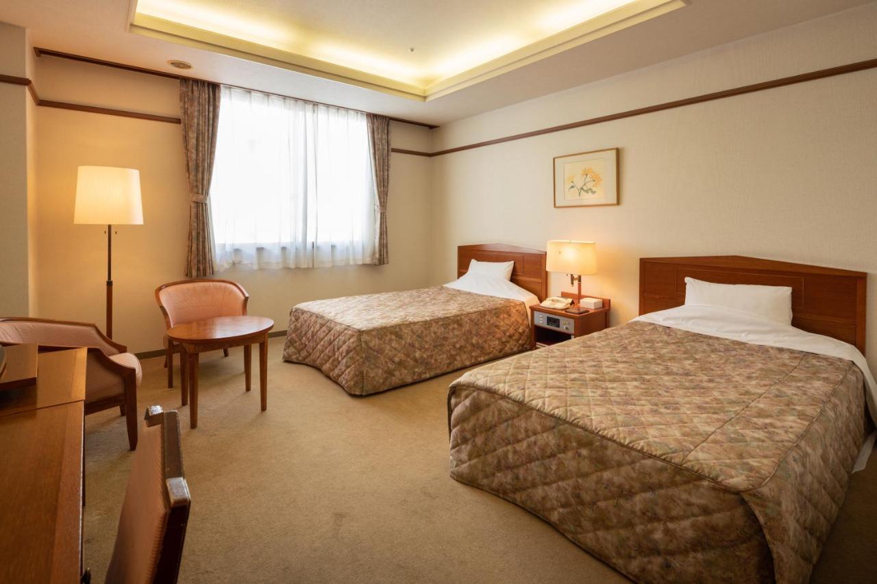 โฮเทล ดันโระกัง Hotel โคฟุ ภายนอก รูปภาพ