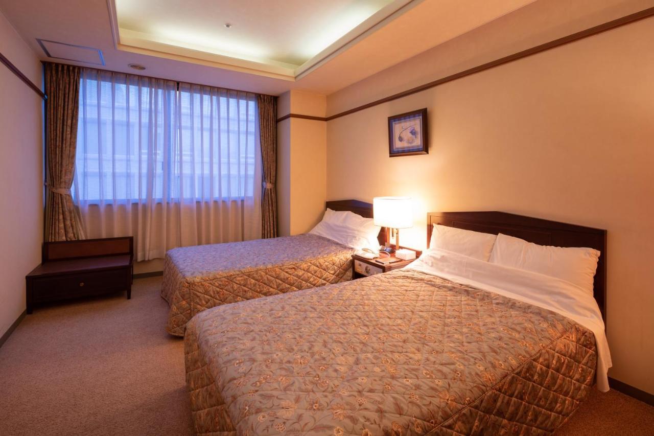 โฮเทล ดันโระกัง Hotel โคฟุ ภายนอก รูปภาพ