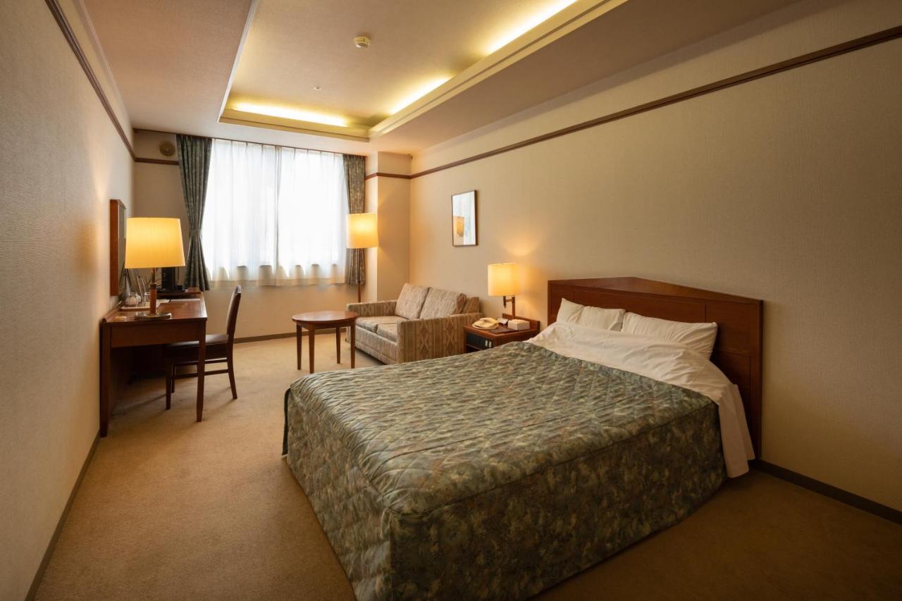 โฮเทล ดันโระกัง Hotel โคฟุ ภายนอก รูปภาพ