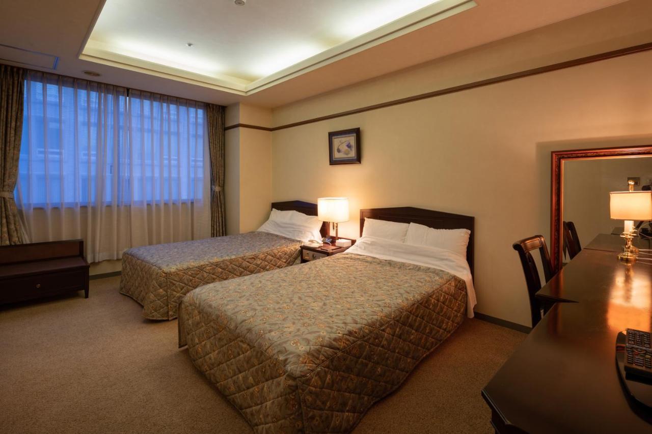 โฮเทล ดันโระกัง Hotel โคฟุ ภายนอก รูปภาพ