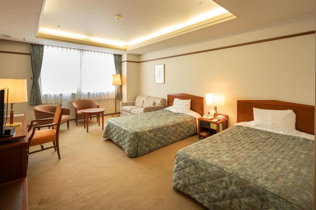 โฮเทล ดันโระกัง Hotel โคฟุ ภายนอก รูปภาพ