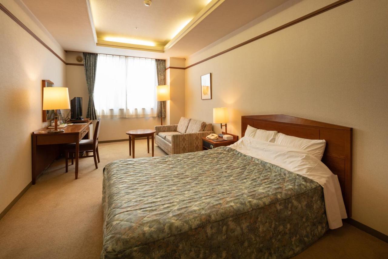 โฮเทล ดันโระกัง Hotel โคฟุ ภายนอก รูปภาพ